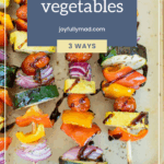 Colorful vegetable skewers with zucchini, red onion, bell pepper, and cherry tomatoes, grilled and drizzled with sauce—perfect alongside turkey lettuce wraps. Arranged on a light surface with a "how to grill vegetables" text overlay.