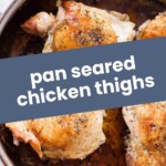 Pan-seared chicken thighs with crispy golden skin in a frying pan, overhead view. Text overlay reads "pan seared chicken thighs" and "joyfullymad.com" at the bottom.