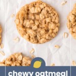 Several oatmeal cookies are arranged on parchment paper with some oats scattered around. Text at the bottom reads "chewy oatmeal cookies" with a small lemon icon above the text.