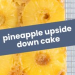 Rectangular pineapple upside down cake with pineapple rings on top, cooling on a wire rack. Text overlay reads "pineapple upside down cake.