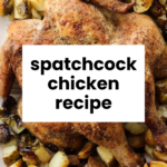 A roasted spatchcock chicken surrounded by diced potatoes and vegetables, shown from above. Text overlay reads “spatchcock chicken recipe.”.